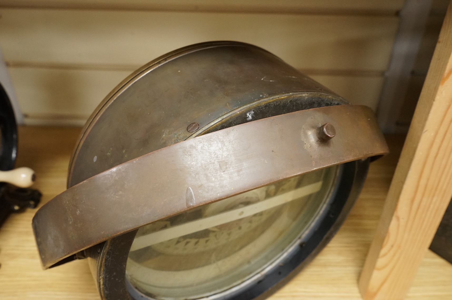 A gimballed brass cased ship's compass, by Kelvin & Hughes Ltd, 33cm diameter